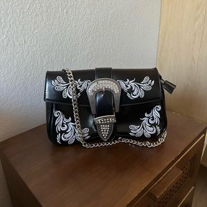 Dolls Kill Poster Grl western embroidered chain bag